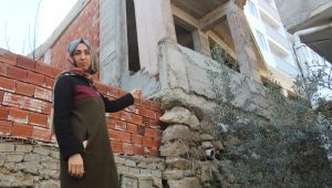 İstinat duvarının üzerine inşa edilen bina vatandaşları korkutuyor