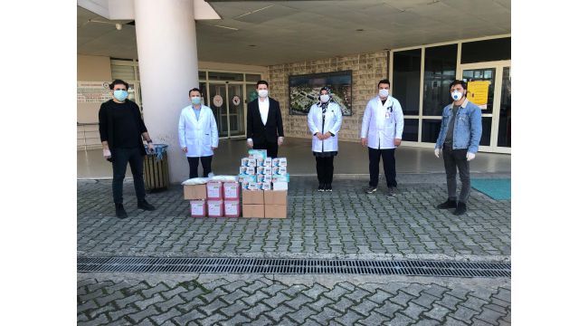 MÜSİAD'dan erzak, maske, dezenfektan ve ateş ölçer yardımı
