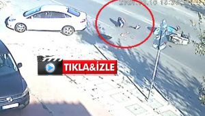 Otomobille çarpışan motosiklet sürücüsü yola savruldu