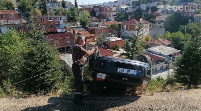 Takla atan araçtan burnu bile kanamadan kurtuldu