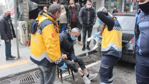 Ayağının üzerinden otomobil geçen yaya yaralandı