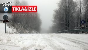 Beyaza bürünen Kartepe'nin yüksek bölgeleri havadan görüntülendi