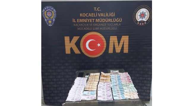 Sahte para ile alışveriş yapan dolandırıcılar yakalandı