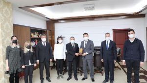 Kaymakam Alkan’dan Başkan Şayir’e teşekkür plaketi