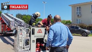 Baygınlık geçiren işçi 30 metre yüksekte mahsur kaldı