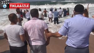 Dalgadaki cismi ceset sanınca denize koştular