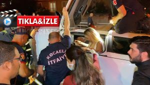 Otomobil yan yattı, içindeki kadın böyle kurtarıldı