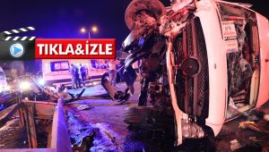 Servis minibüsü bariyere çarparak yan yattı