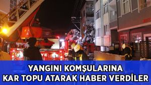 Çıkan yangını daire camlarına kar topu atarak haber verdiler