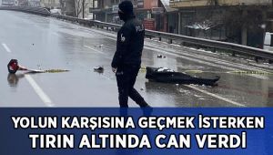 Yolun karşısına geçmeye çalışırken tırın altında can verdi