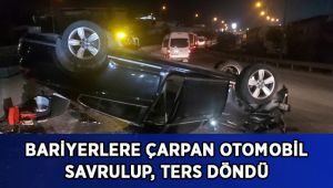 Bariyerlere çarpan otomobil karşı yola savrulup, ters döndü