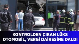 Kontrolden çıkan lüks otomobil, vergi dairesine daldı