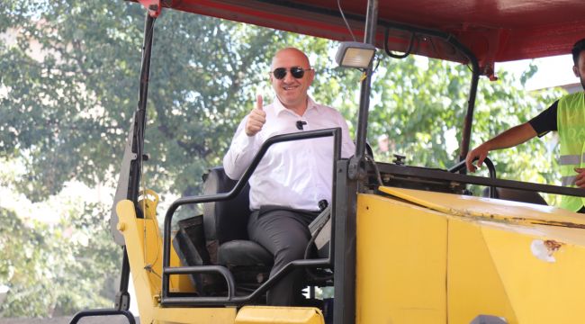 Bıyık, asfalt makinesiyle yolları asfaltladı