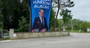 CHP'li Yıldızlı'nın seçim afişi mezarlığa asıldı