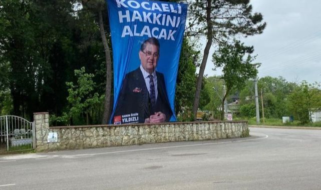 CHP'li Yıldızlı'nın seçim afişi mezarlığa asıldı