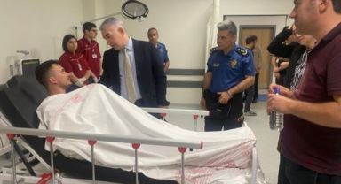 Karaduman ateş açılarak yaralanan polis memurunu ziyaret etti
