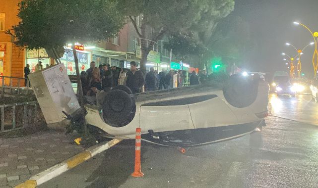 Halk otobüsüne çarpan otomobil takla attı