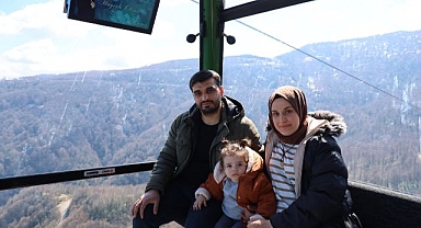 Teleferiğin ilk yolcusu 1 yaşındaki Mila bebek