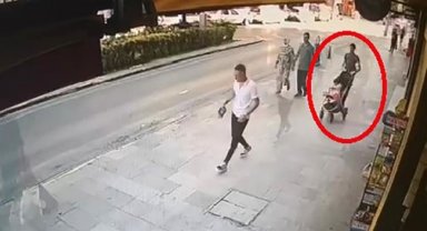 Bebek arabasıyla gezinirken beğendiği başka arabayı kucağında bebeğiyle çaldı